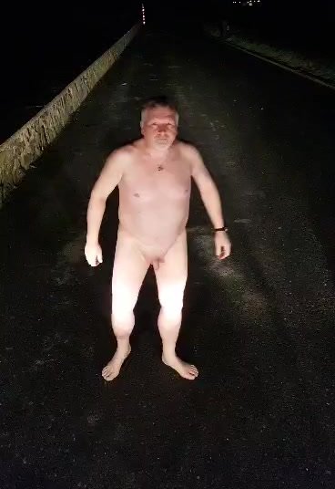 Faggot Rob naked on the road