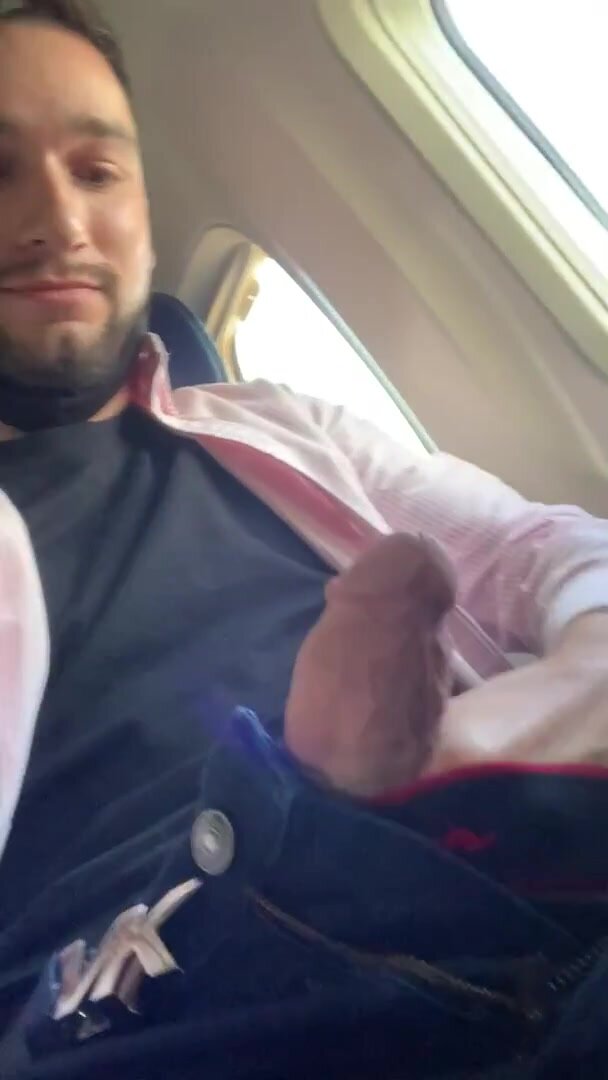 cute guy shows dick on airplane