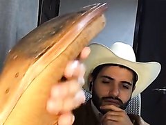 Boy shows his leather cowboy boots