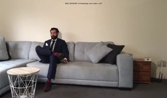 Who is this suit muscle hunk