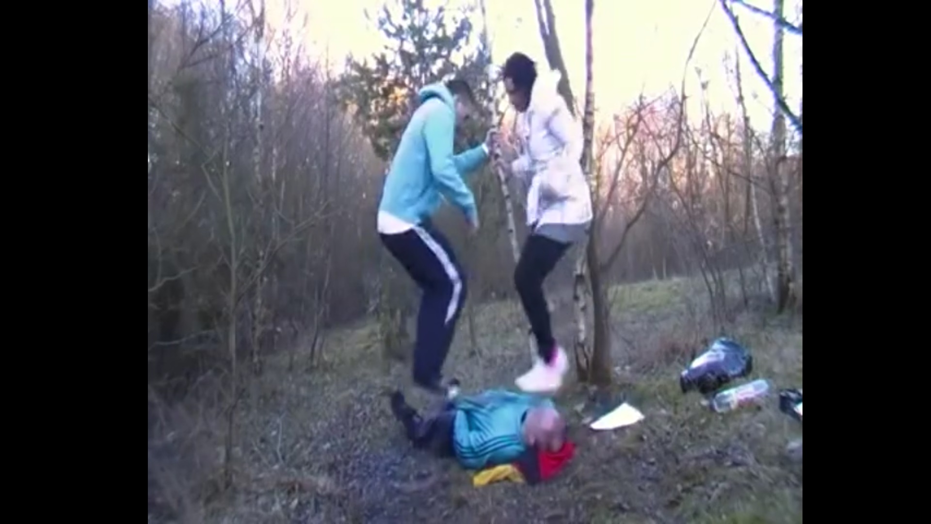 The couple tortures the man they found in the forest