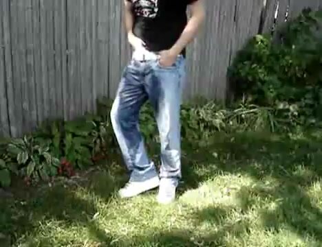 PIssing in jeans in the garden