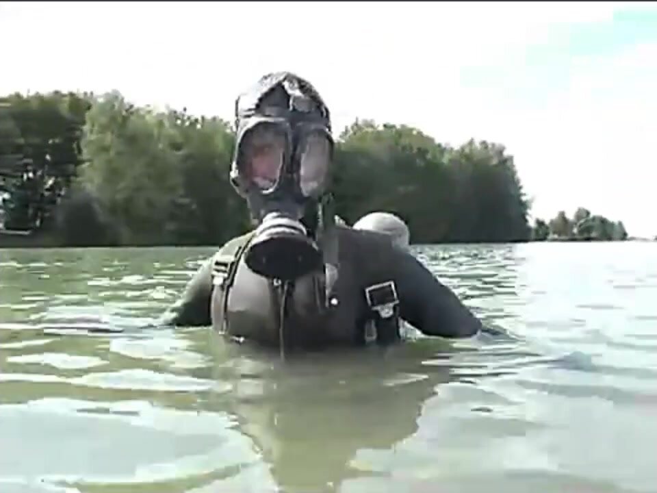 Female Diver is Wearing Vintage Rubber Wetsuit and Gasm