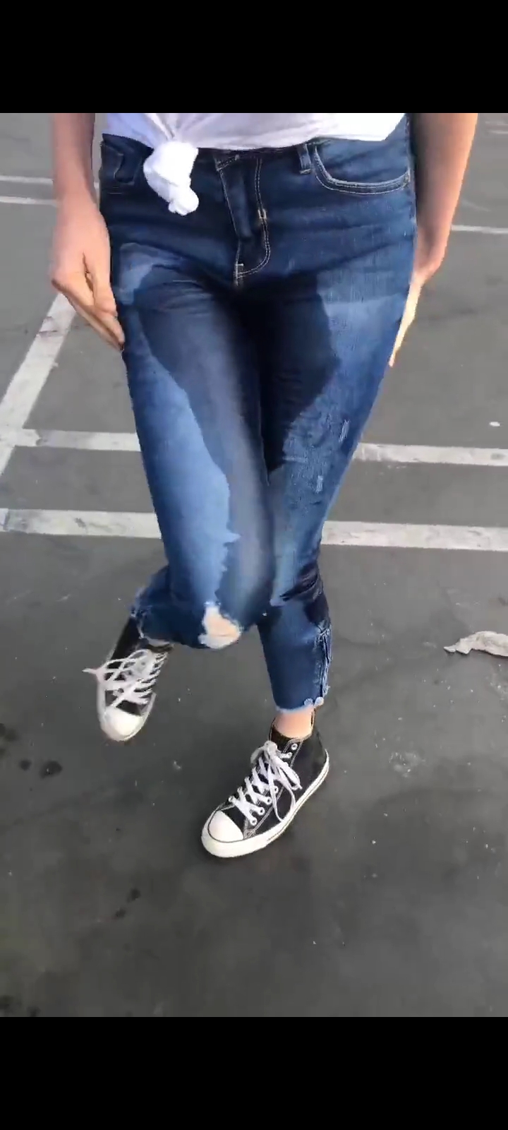 Pee jeans at parking lot