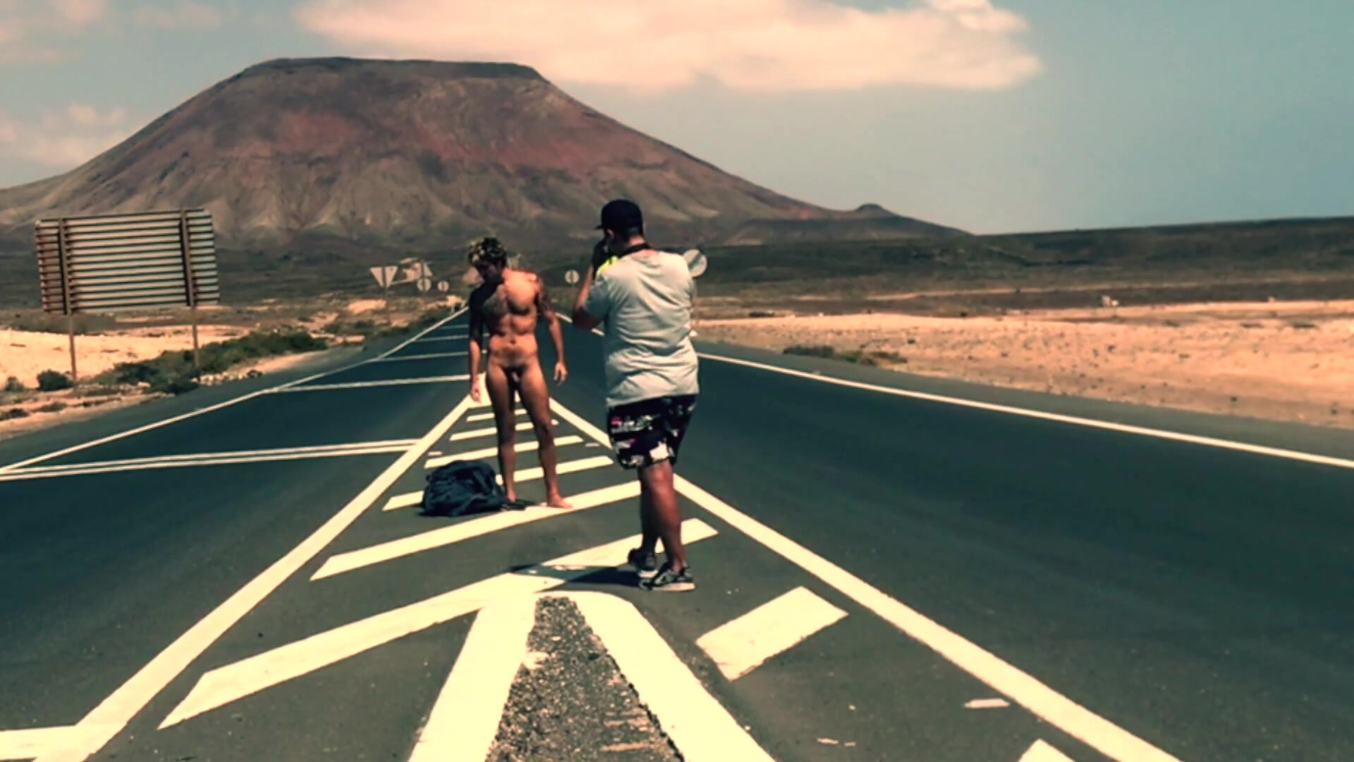 naked photo shoot on the road