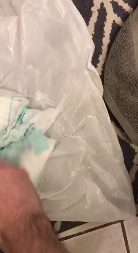 Opening a poopy pampers size 6
