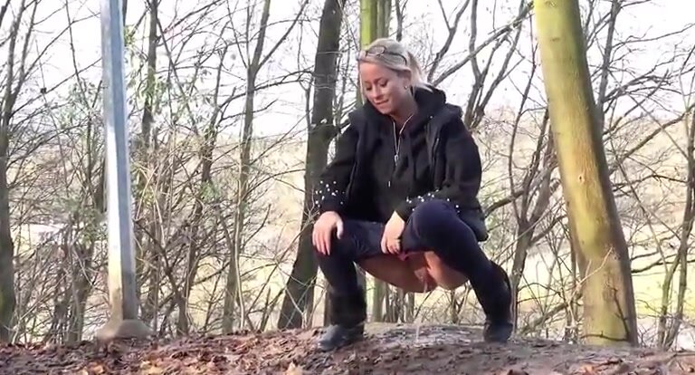 Public Pissing - Blonde pees in the forest