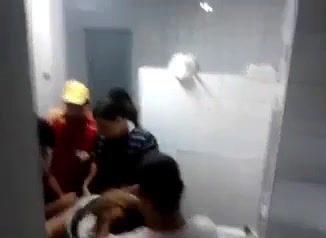 Amateur gangbang in a public toilet