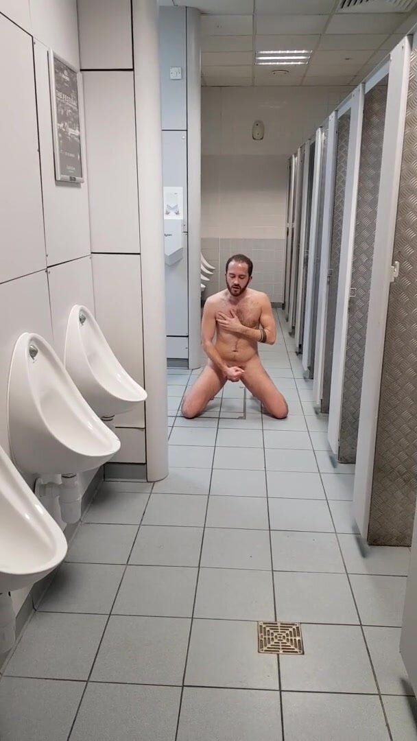 Young exhib naked wanking at the local toilets