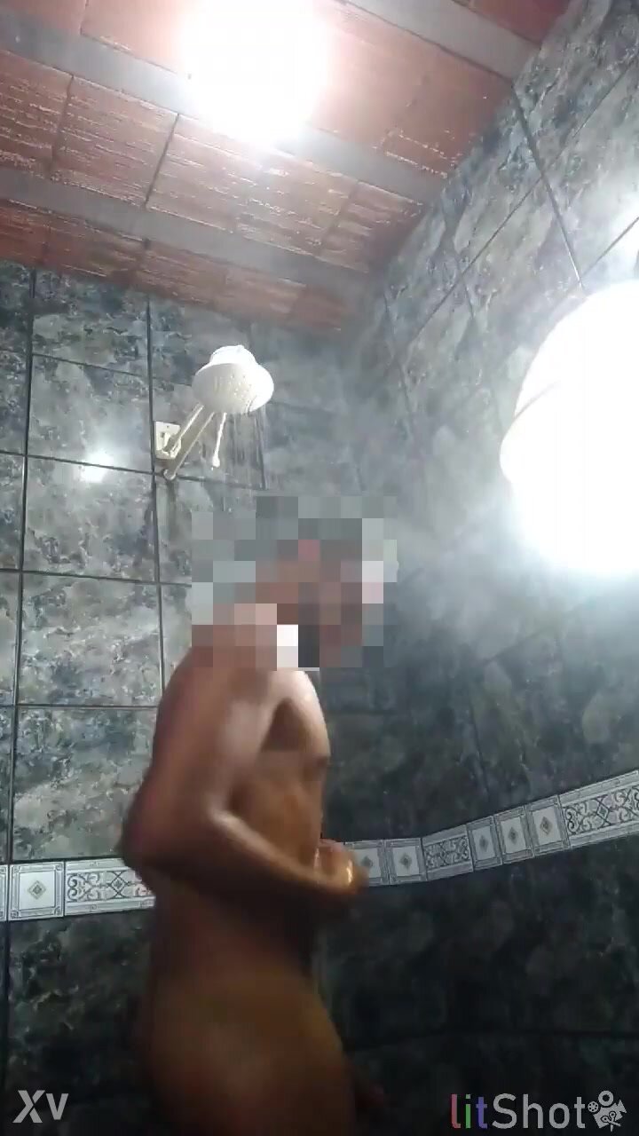 Young black dude with big dick at shower