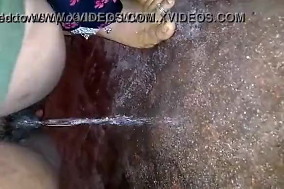 Indian wife peeing on flore for husband