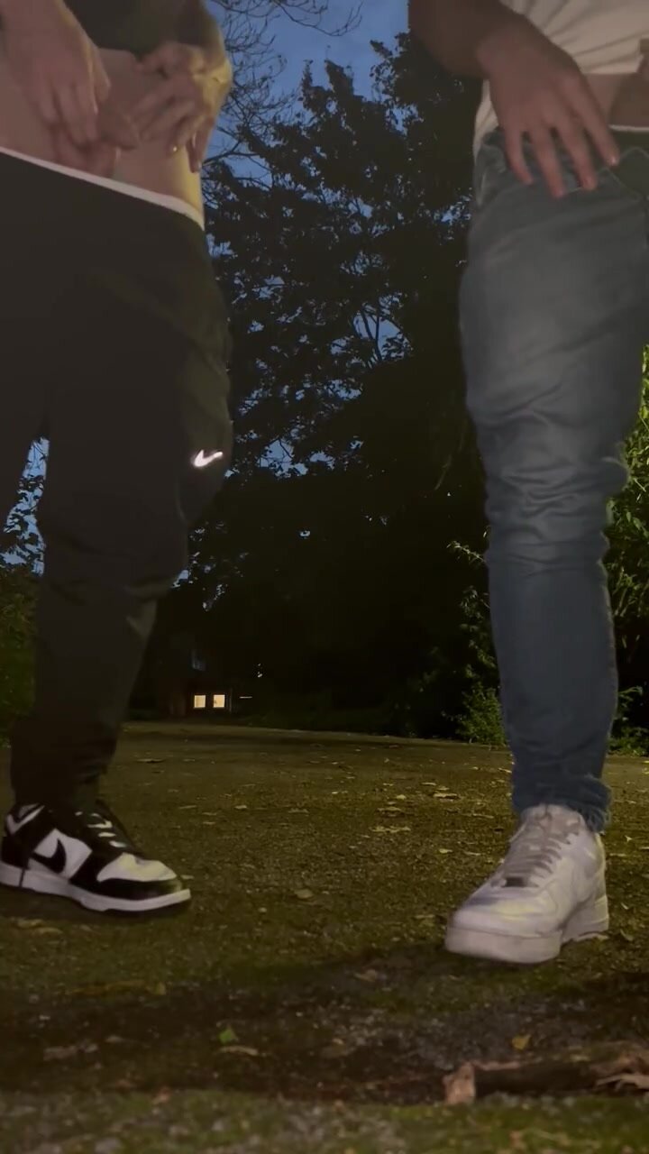 two uk friend pissing together