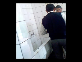 another guy caught jacking his cock in the restroom stall