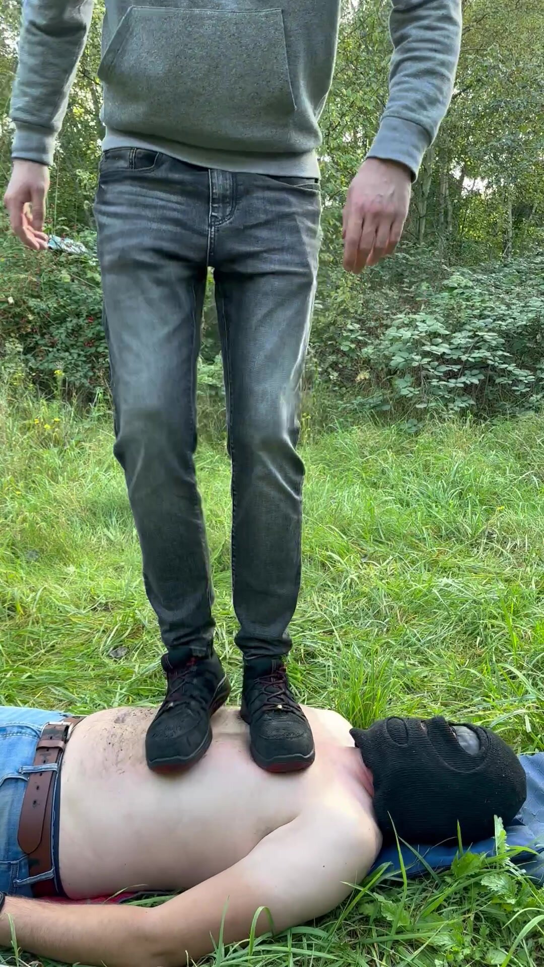 Trampling and jumping in dirty work boots