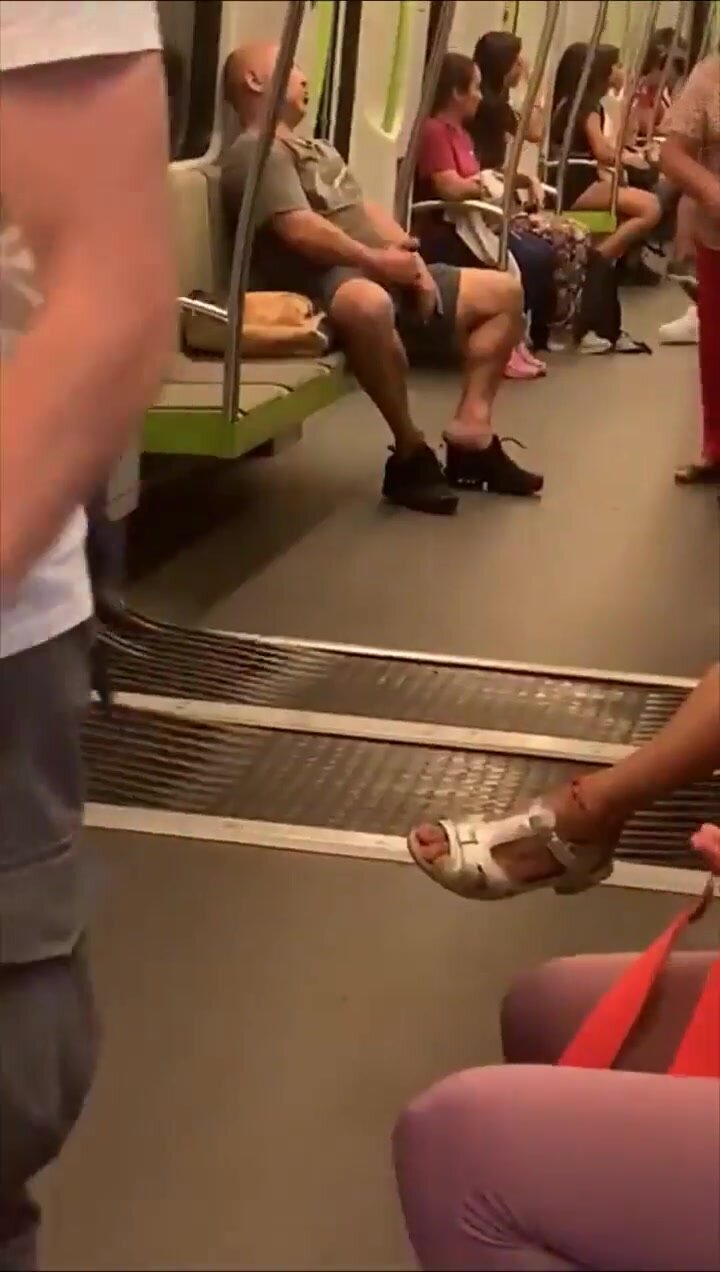 strong big guy masturbates in public train