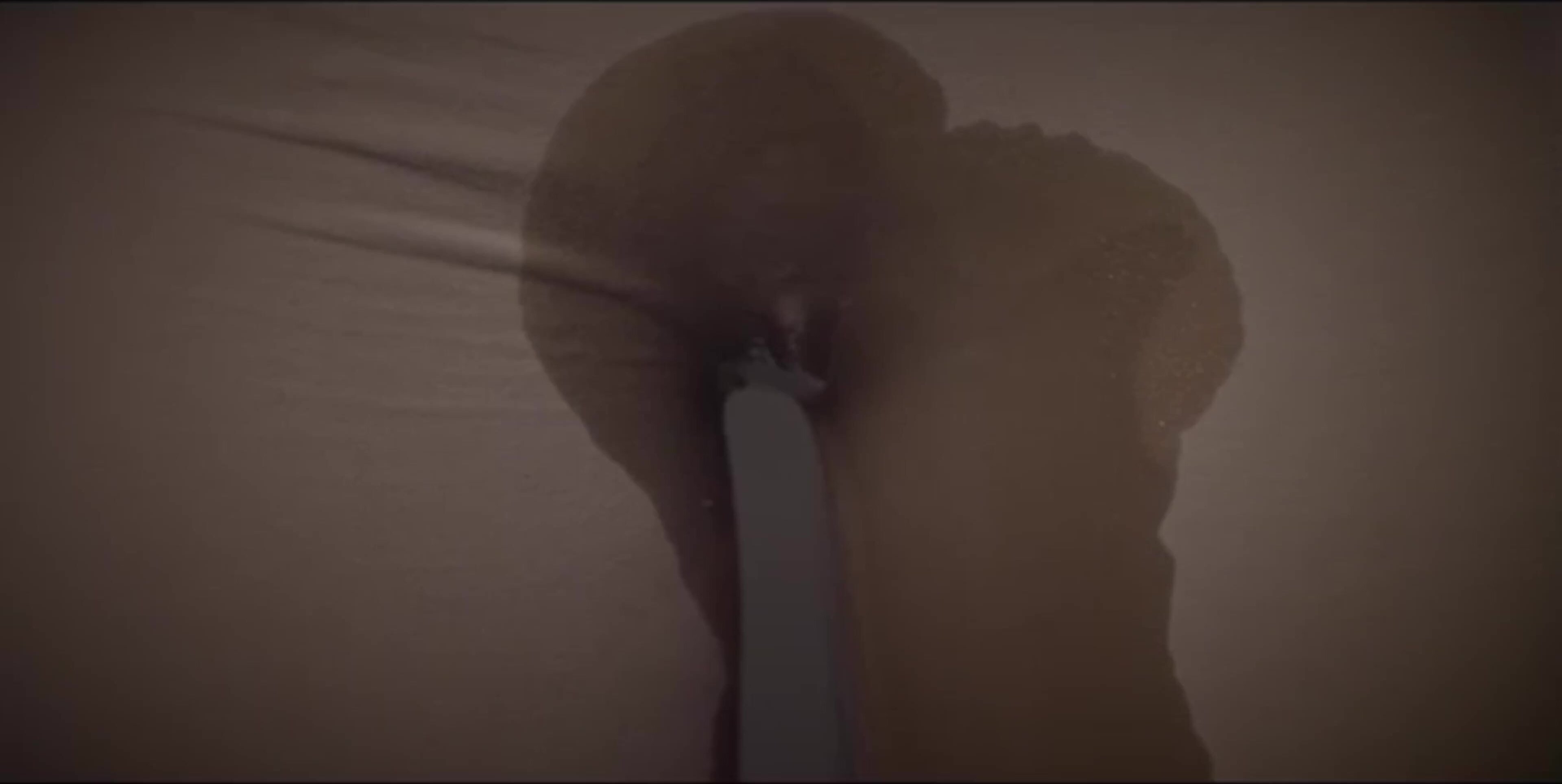 A wetting scene from a music video