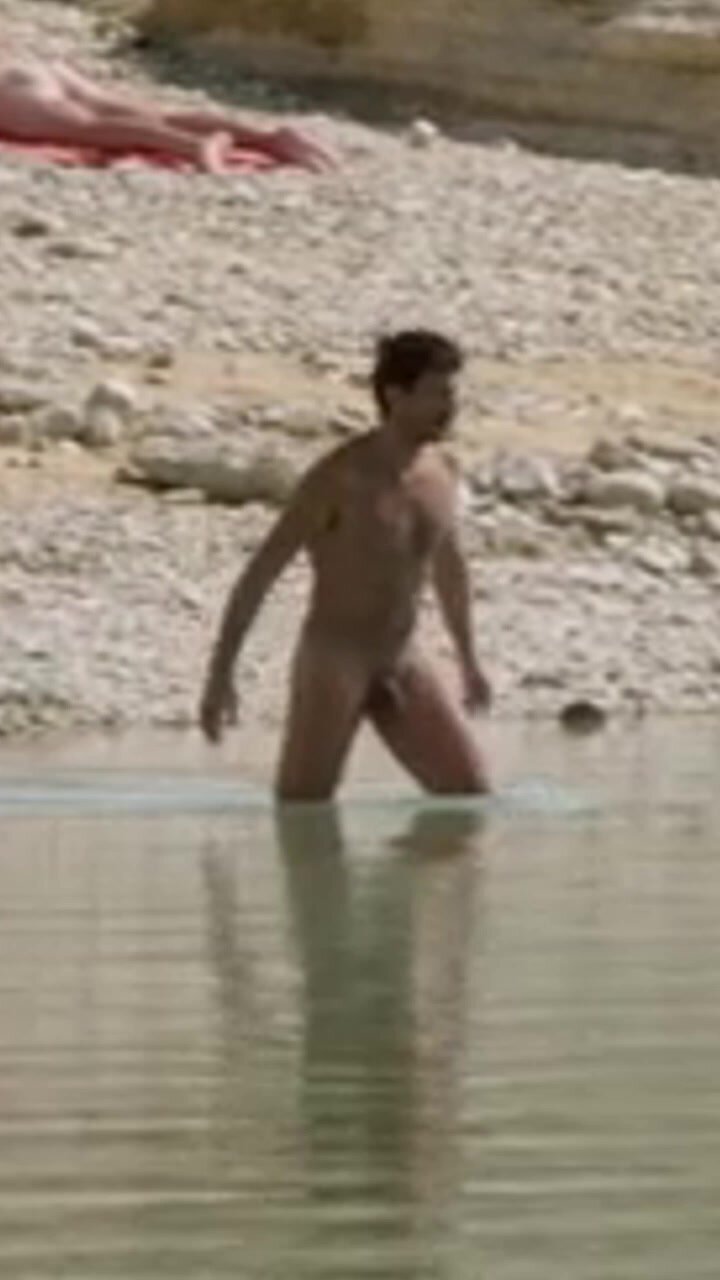 Man dives into lake naked