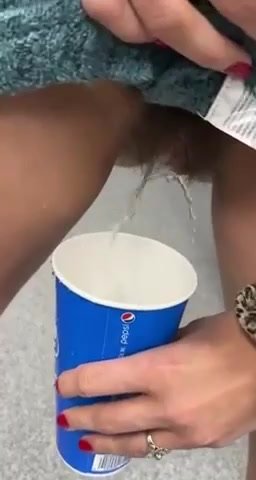 Pissing in the cup - video 4