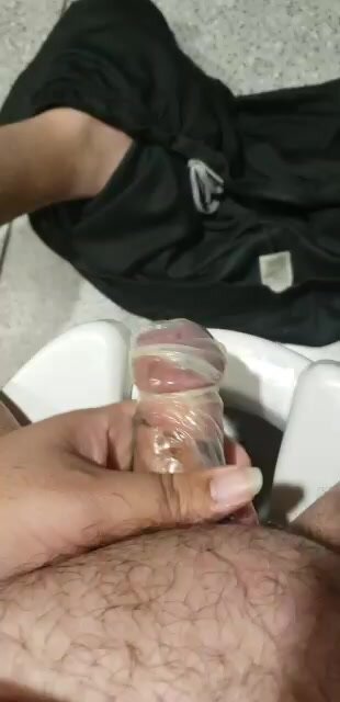 Jerking off with found condom