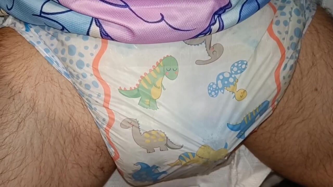 Squishing soaked dino diaper and cumming inside