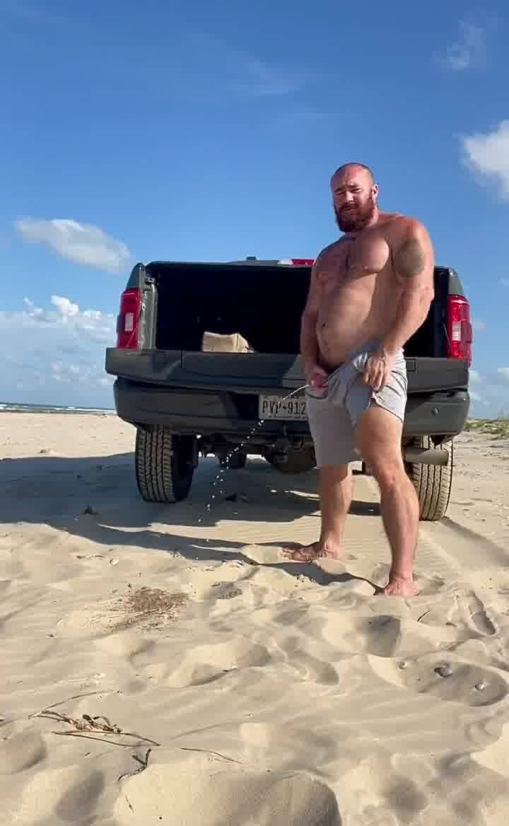 Beefy bearded dad piss at beach and almost gets caught