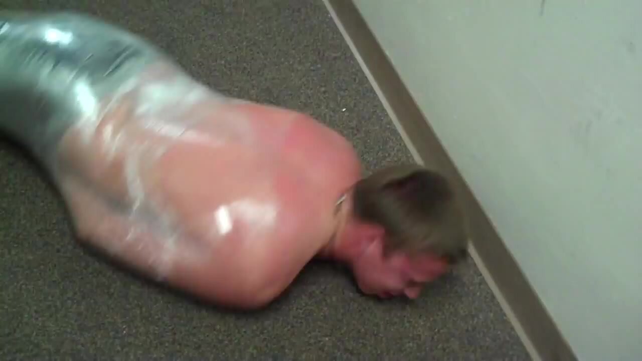shirtless college guy gets cling film in the dorm