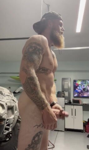 Bearded tatted ginger with a huge cock cums