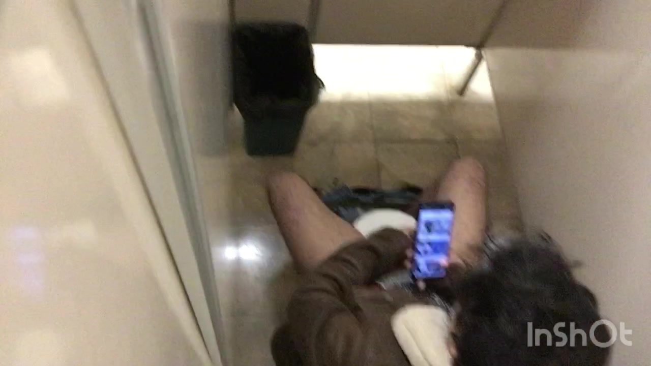 Man stroking in toilet