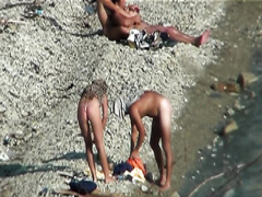 Horny couple caught having sex on the beach