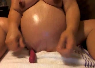 Pregnant milf playing with her hairy pussy
