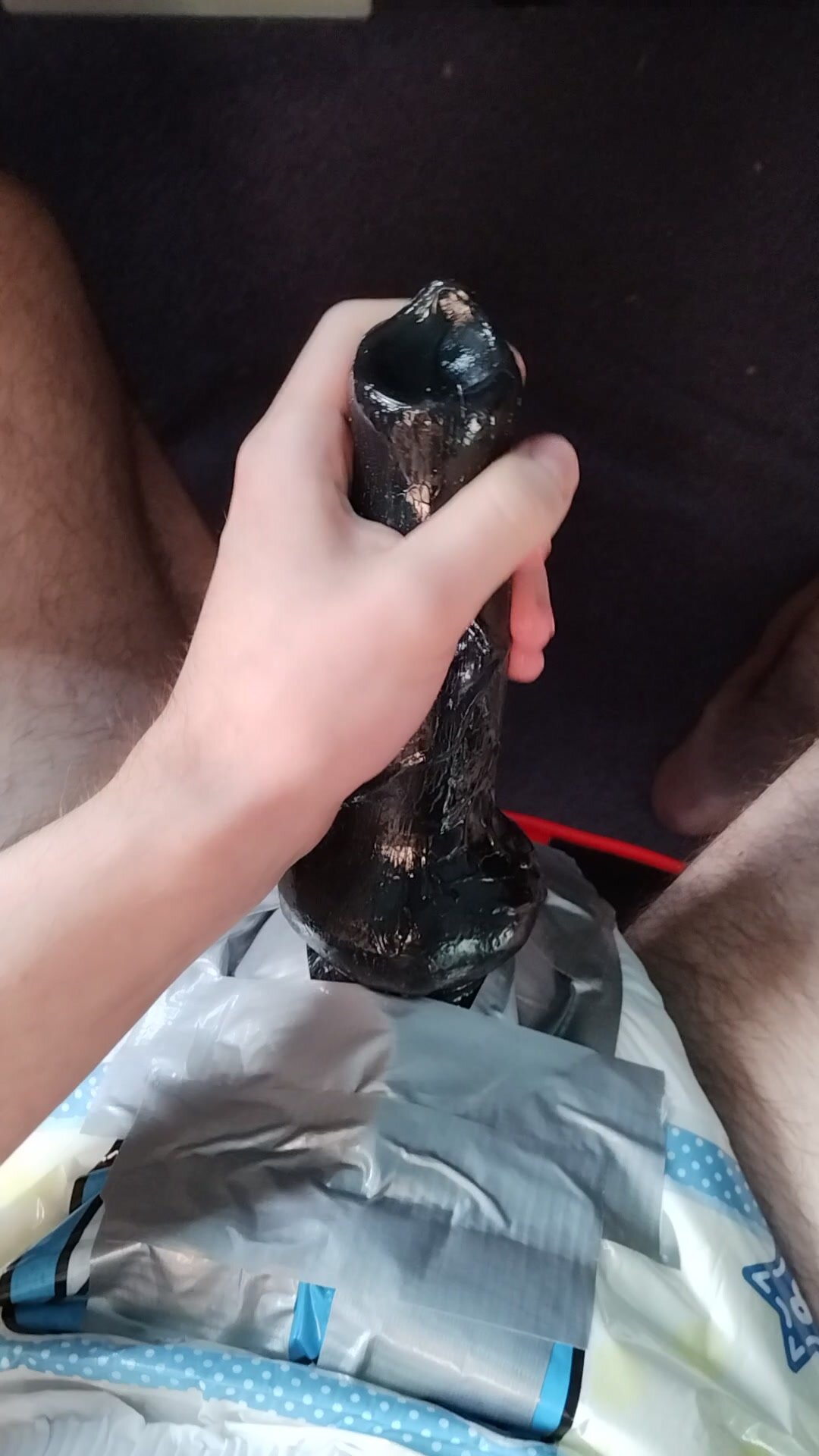 Diaper boy strokes his new cock
