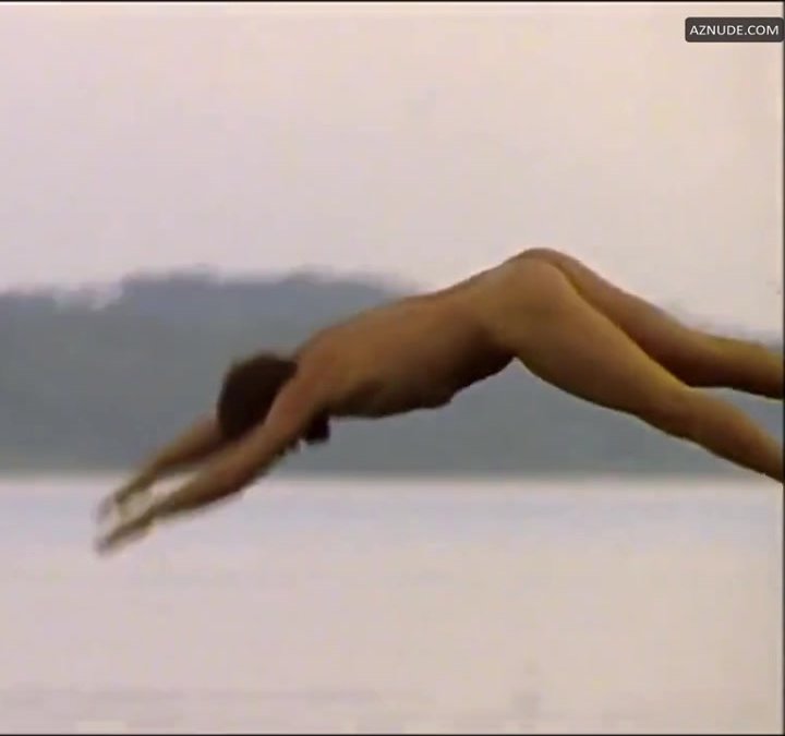 Man strips and jumps into lake naked (Movie/full front)