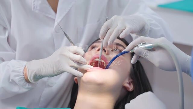 Young woman at dentist