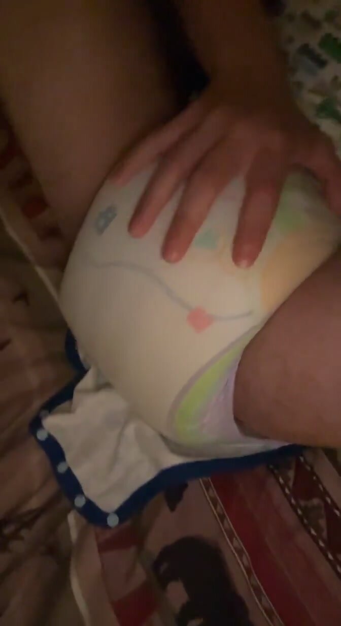 guy rubs super thick diaper