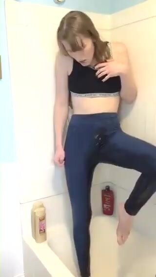 Drenching her pants in tub