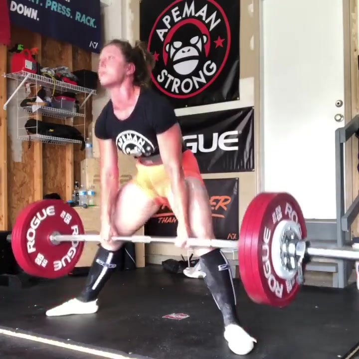 Strong babe starts dripping during dead-lift