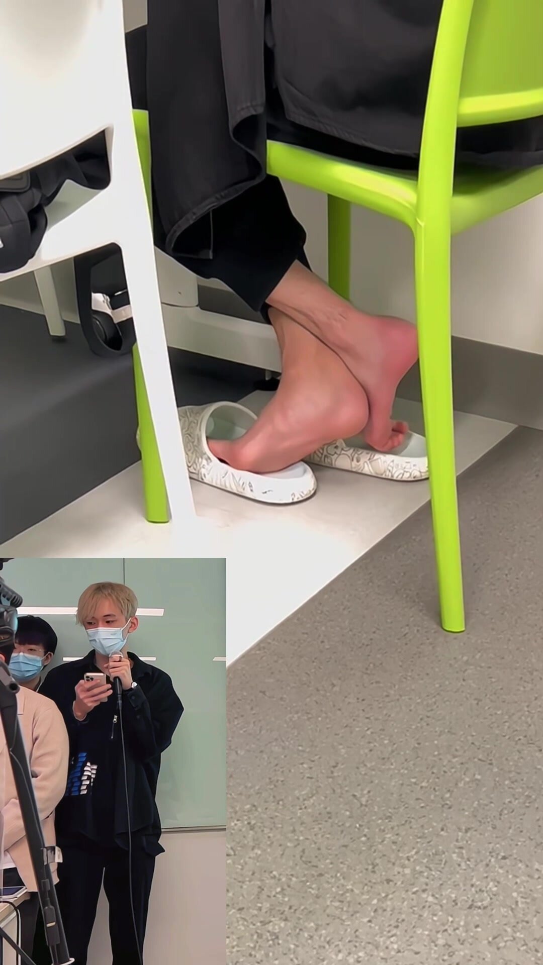 Handsome masked student played his feet under chair