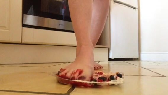 barefoot fruit crushing