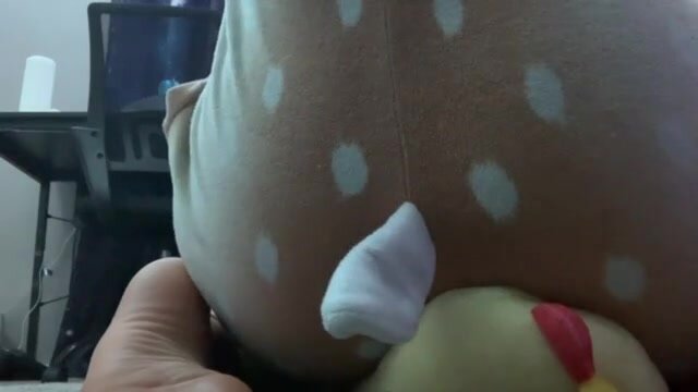 Girl farting stuffed animal