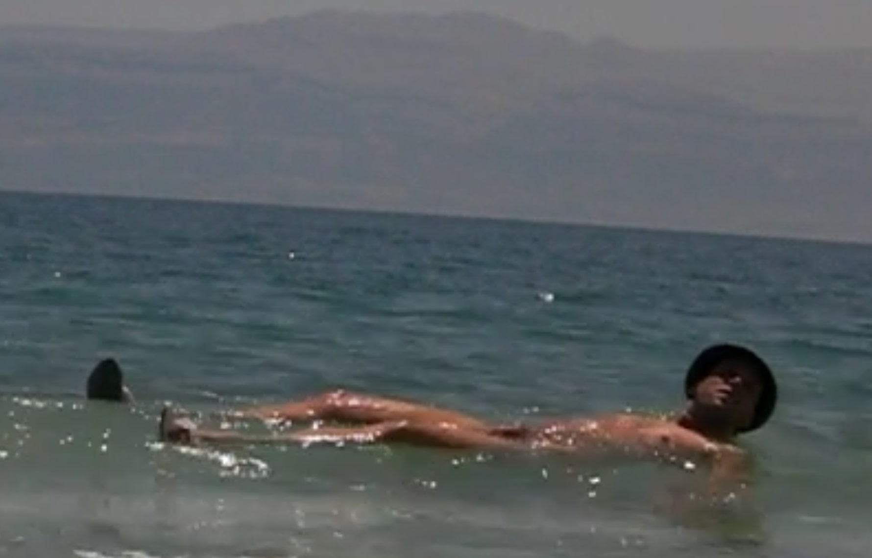 Naked Floating in the Dead Sea