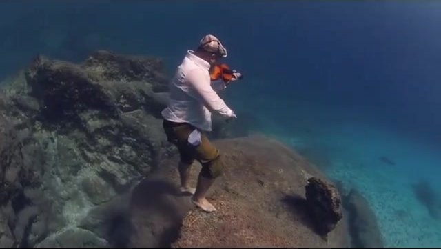 Beefy underwater beefy violin player