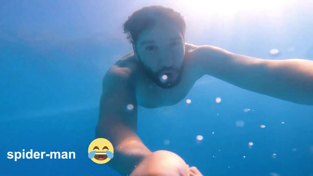 Barefaced bearded arab hunk underwater in pool