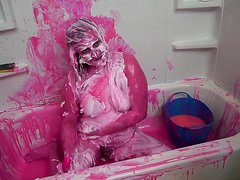 girl self sploshing in tub