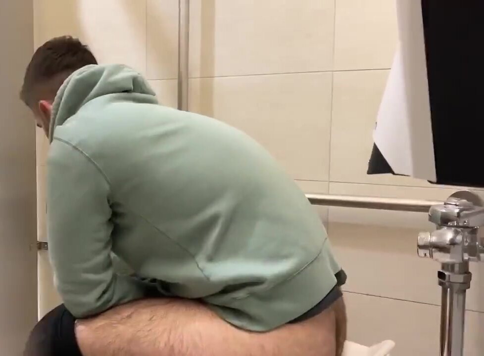 Hairy ass spied in public toilet