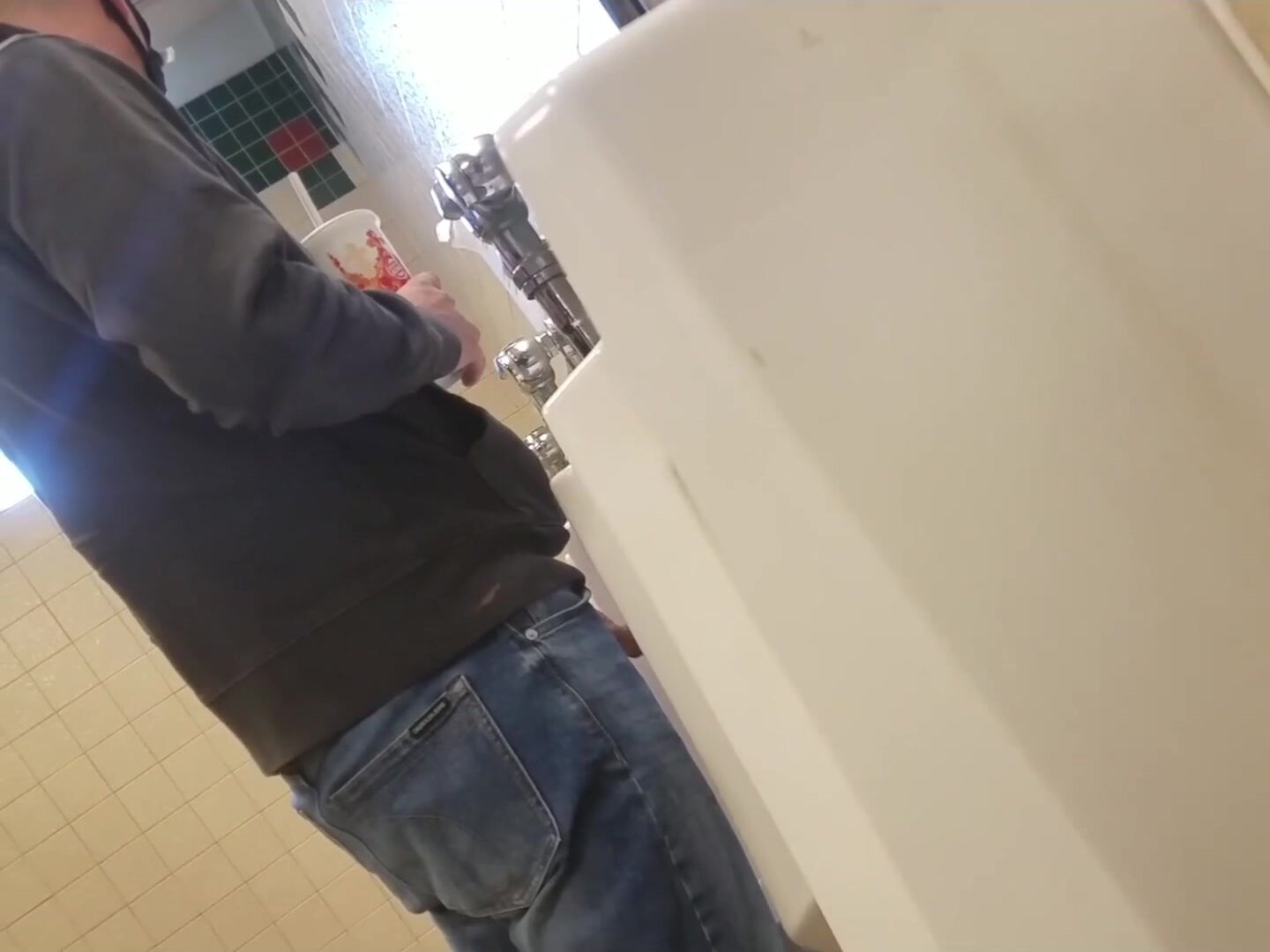 Spying on dude at urinal