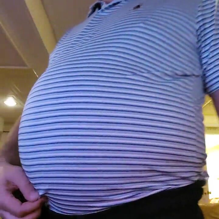 Stuffed Dilf shows off his gut