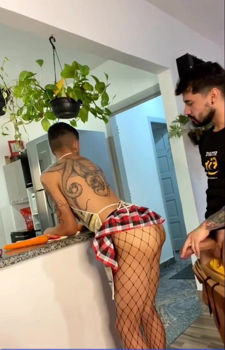 Helping the cook by piping warm cream into his buns