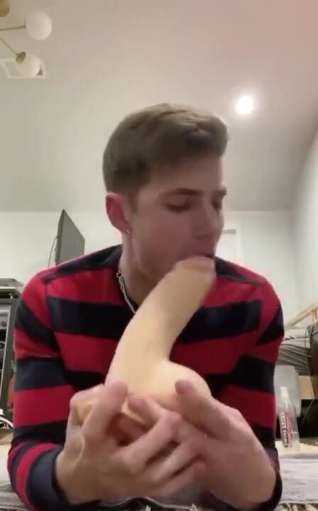 cute guy worships dildo