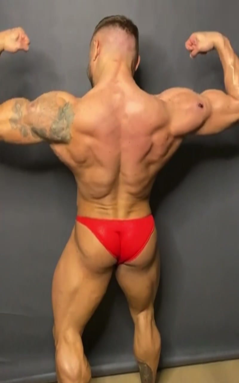 Bodybuilder Pumping and Posing