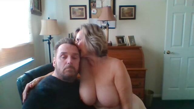 Hot GILF naked and sucking younger cock